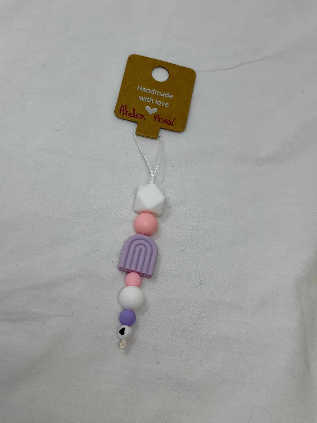 Bijou téléphone arc-en-ciel 13cm rose mauve perles multicolores Atelier Aorée
