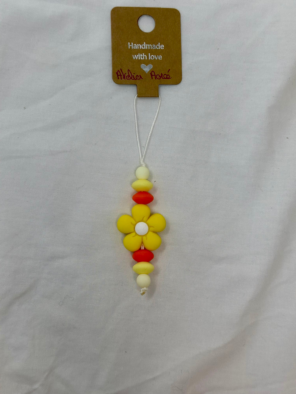 Bijou téléphone yellow 13cm solaire énergie positive perles jaunes Atelier Aorée
